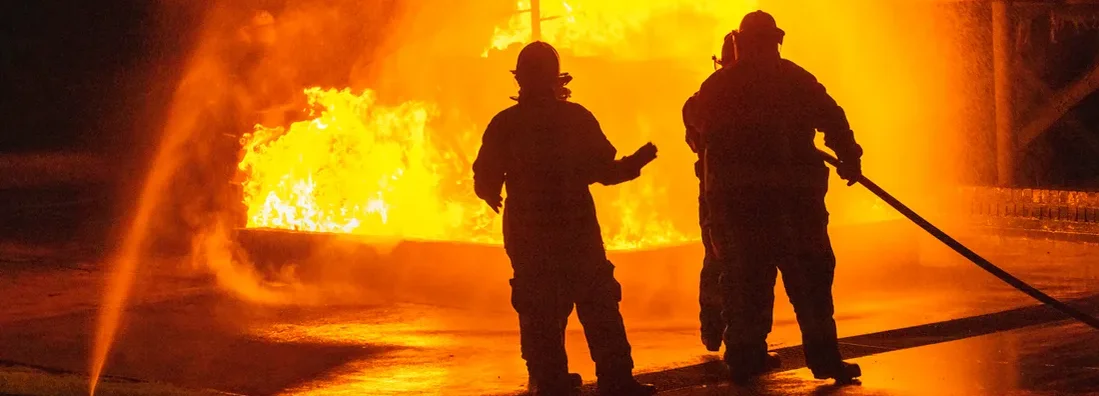 Firefighters extinguish the huge fire. Find Fire Legal Liability Insurance.