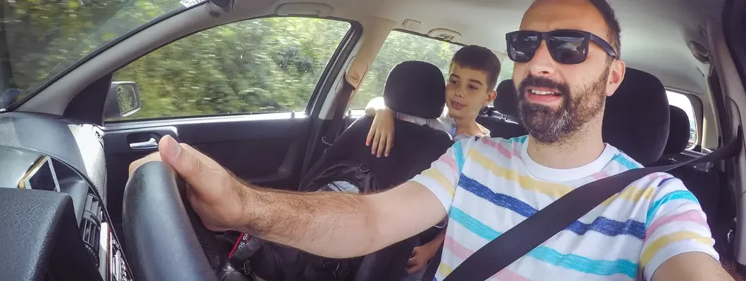 Family traveling in car. Find Jenks, Oklahoma car insurance.