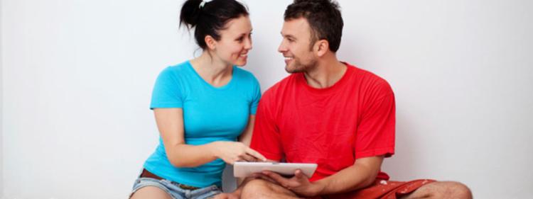 young married couple in new home