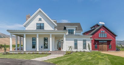 Gorgeous New England style modern farmhouse with separate living space. Homeowners vs. Renters Insurance.