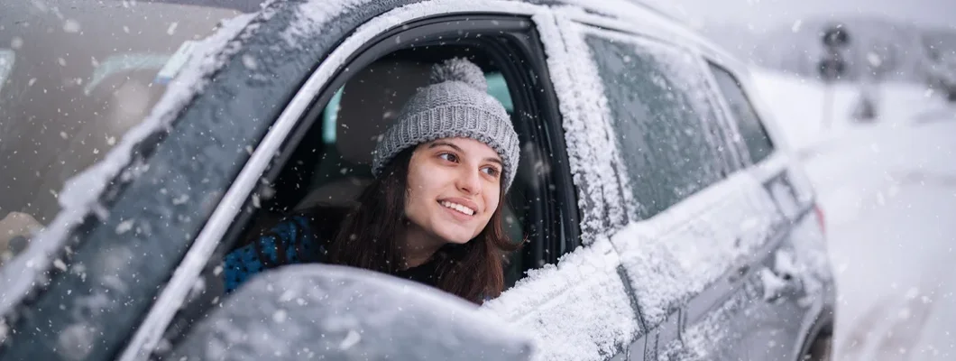 Young woman on a winter journey. The 5 Best All-Wheel Drive and Four-Wheel Drive Cars.