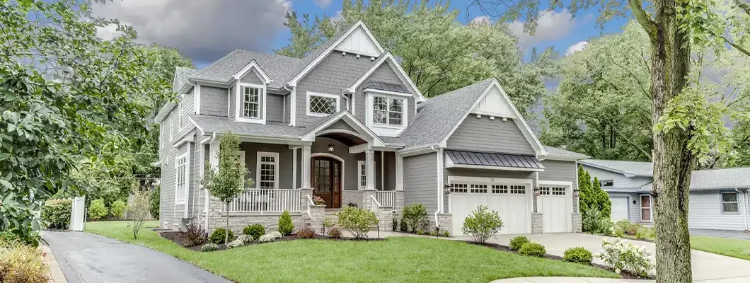 Three car garage and big front yard. How to Find the Best Homeowners Insurance Coverage in Blue Springs, Missouri.