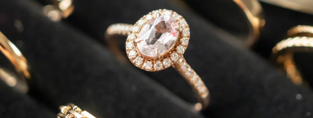 Gold jewelry diamond rings show in luxury retail store display showcase. Find Jewelry Insurance.