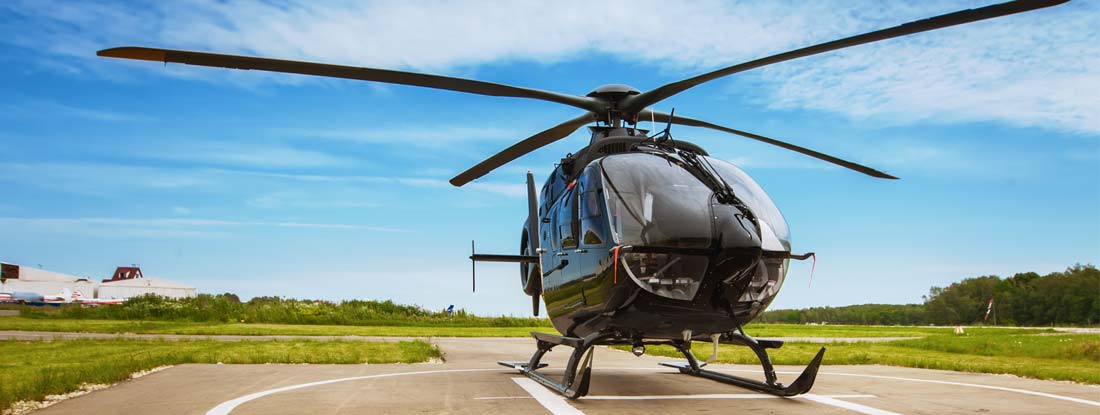 Helicopter parked at the helipad. Find Helicopter Insurance.