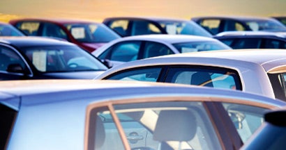 Close up of field of used cars. Used Car Negotiation Tips.