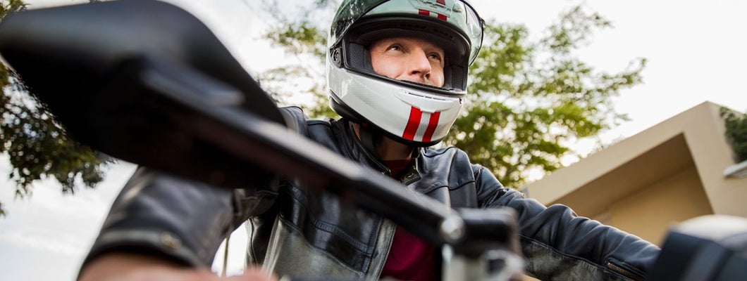 Low angle view of man riding motorcycle. Find Philadelphia Pennsylvania motorcycle insurance.