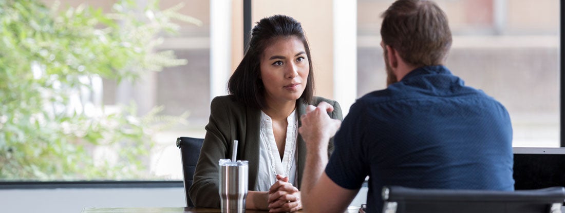 Attentive landlord listens to potential renter. Find Maine landlord insurance.