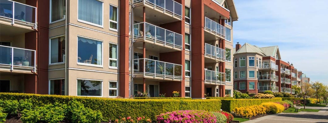 Modern condominium buildings. Find Indiana condo insurance.