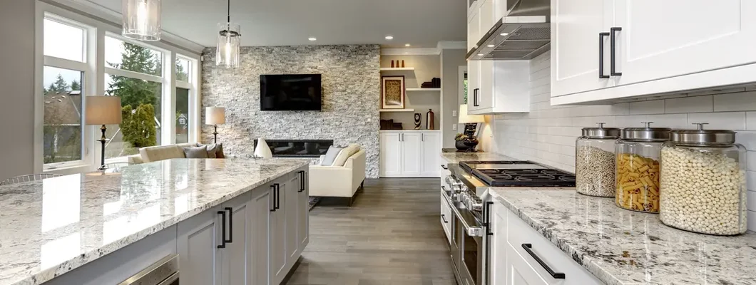 Kitchen in luxury home modern interior with island and stainless steel chairs. Swathmore, Pennsylvania Homeowners Insurance. 
