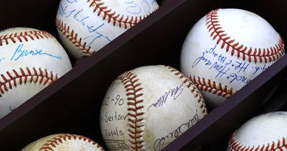 Baseball display with autographs. Does My Home Insurance Cover My Sports Collection?