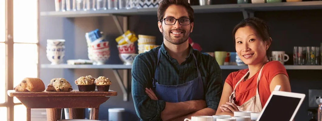 Couple Running Coffee Shop Behind Counter. Find Villanova, Pennsylvania business insurance.
