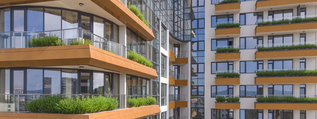 Modern residential building background. How Much Is Condo Insurance?