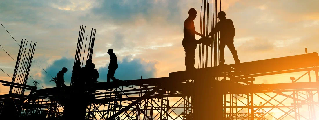 Engineer and construction team working at site. Find Builders Risk Insurance.