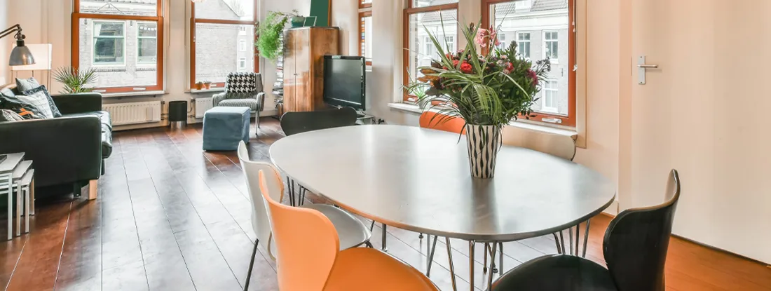 Combined living and dining area in condominium. Find South Carolina condo insurance.