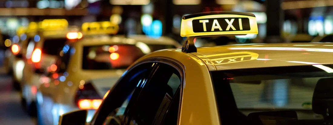Sign of a waiting taxi. Find Taxi Insurance.