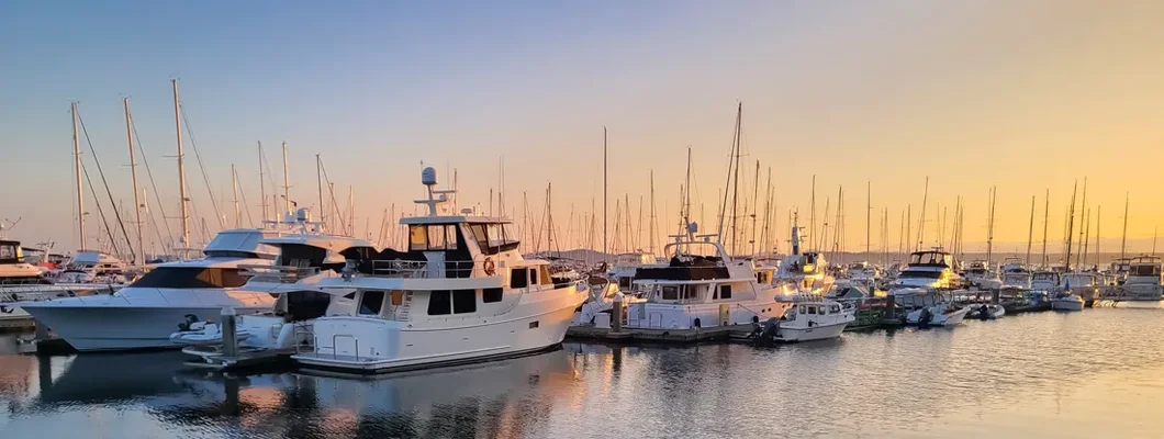 Boats Moored at Dusk. Find Oregon Boat Insurance.