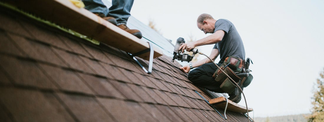 Working on roof. Mississippi Business Liability Coverage Insurance