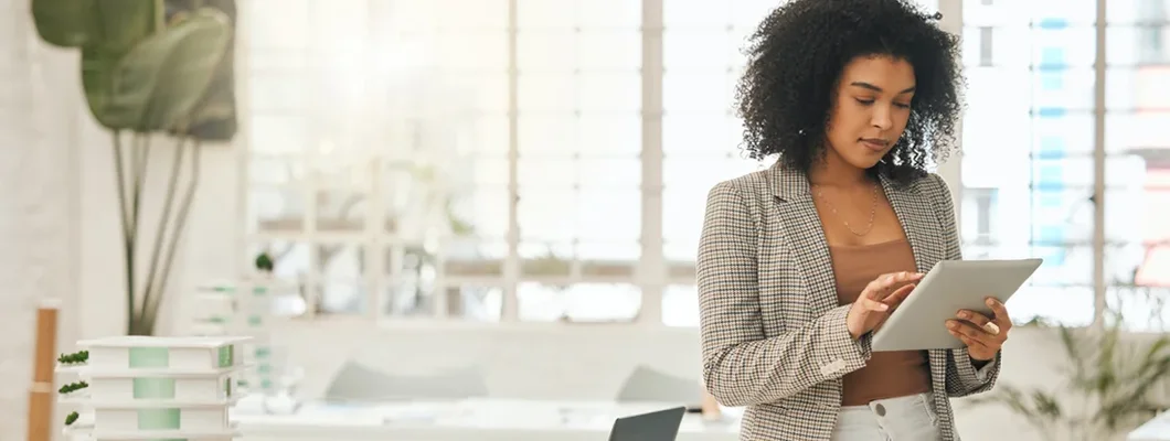 Young businesswoman using a digital tablet. How to Find the Best Business Insurance in Middleton, Wisconsin.