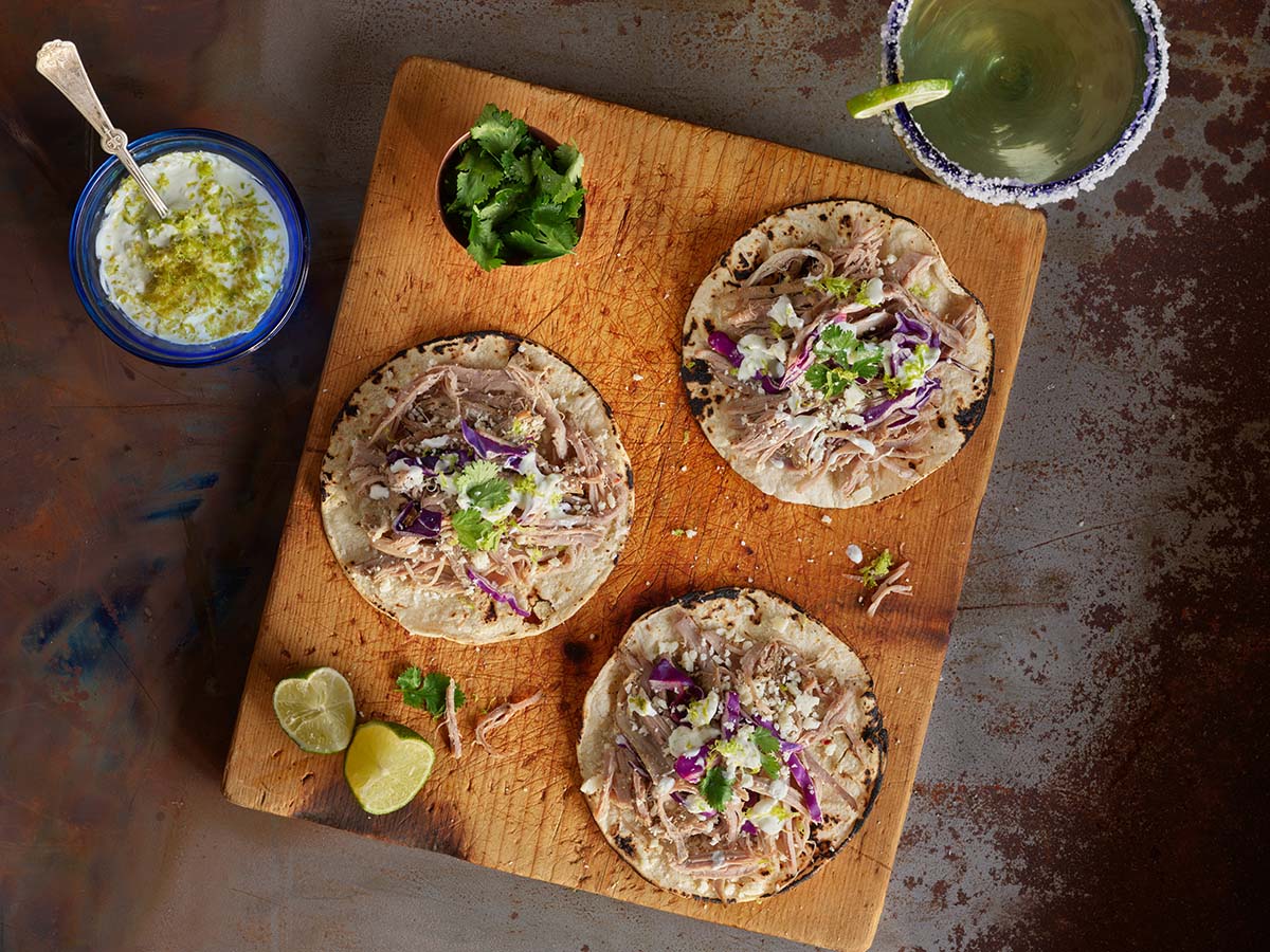 Pulled Pork Street Tacos with Cotija Cheese and Lime Crema