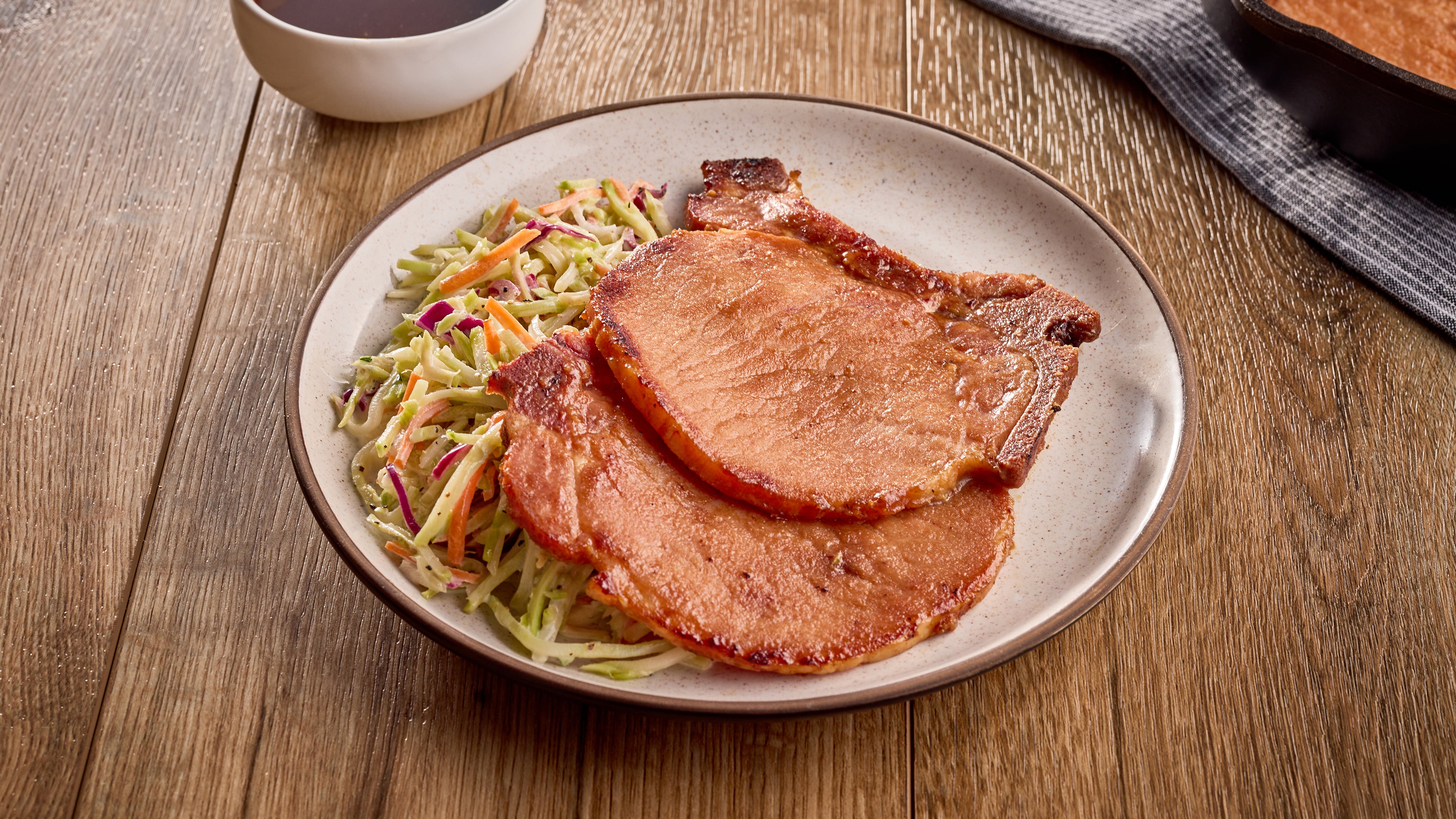 Glazed BBQ Hickory Smoked Bone-In Pork Chop with Broccoli Slaw
