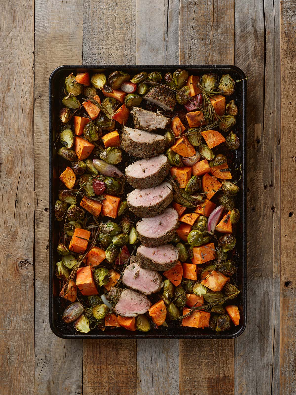 Sheet Pan Tenderloin with Fresh Herbs, Sweet Potatoes and Brussel Sprouts | Smithfield