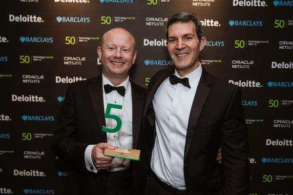 Phlip Miller and Philip Dutton accepting Fast 50 award