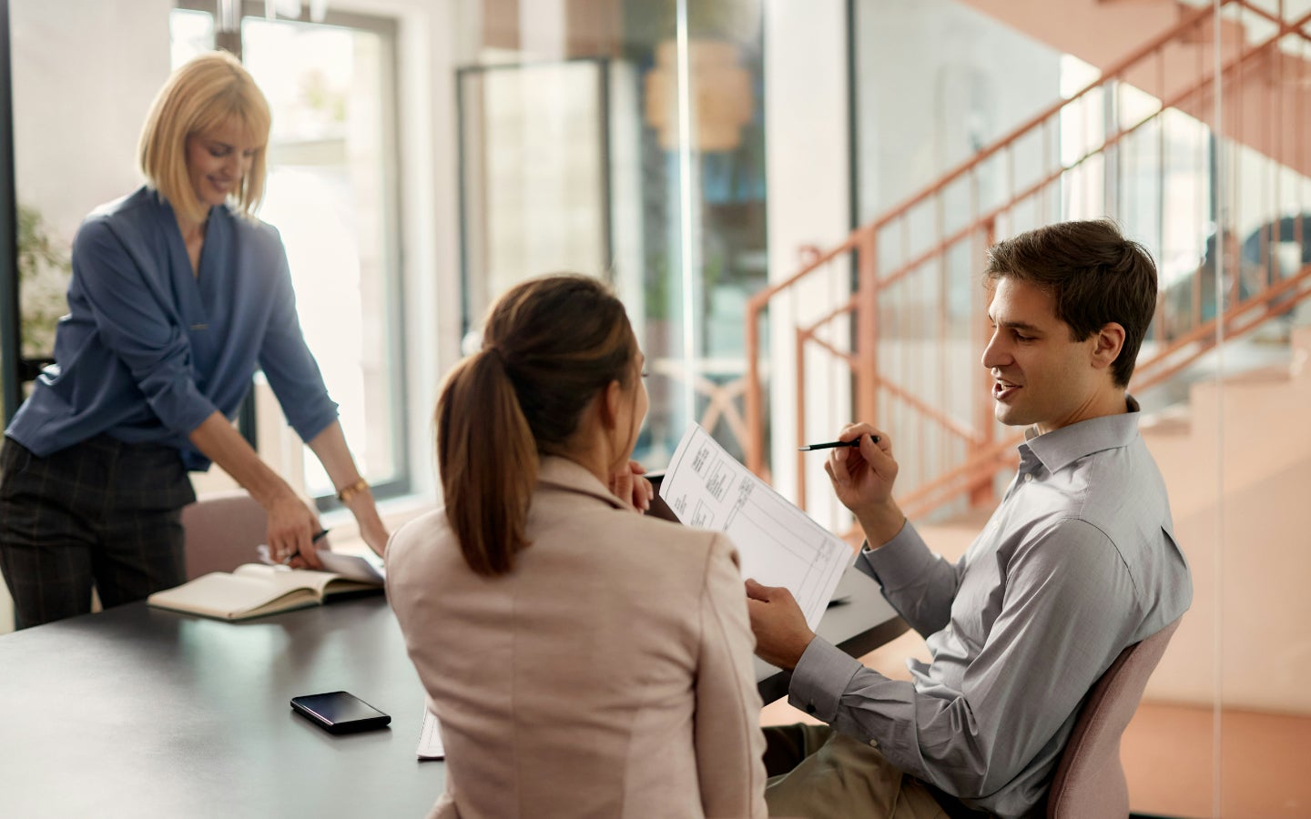 A group of workers at a table