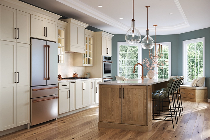 A New England style kitchen with white cabinets.