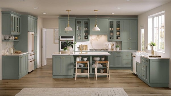 Open style kitchen with stunning green cabinets