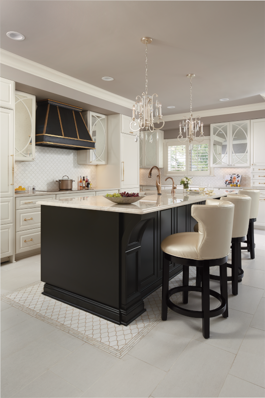 A modern kitchen with white wood cabinets, a black wood kitchen island, and white countertops, floors, and chairs.