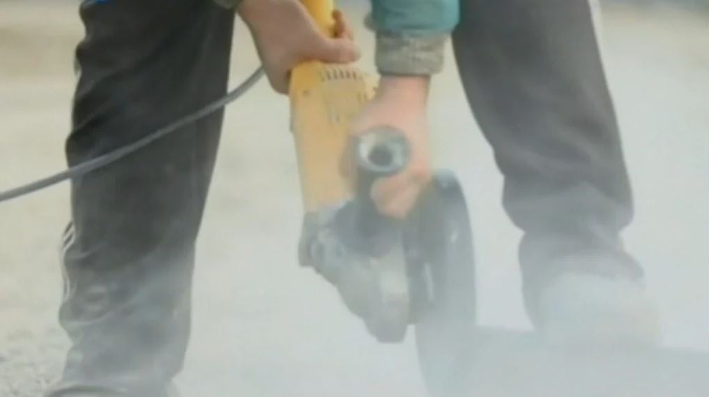 Stone cutting worker