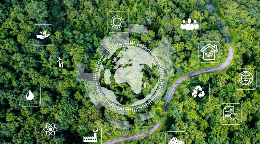 Aerial view of a dense forest with sustainability icons, including recycling and renewable energy, overlayed on the image.