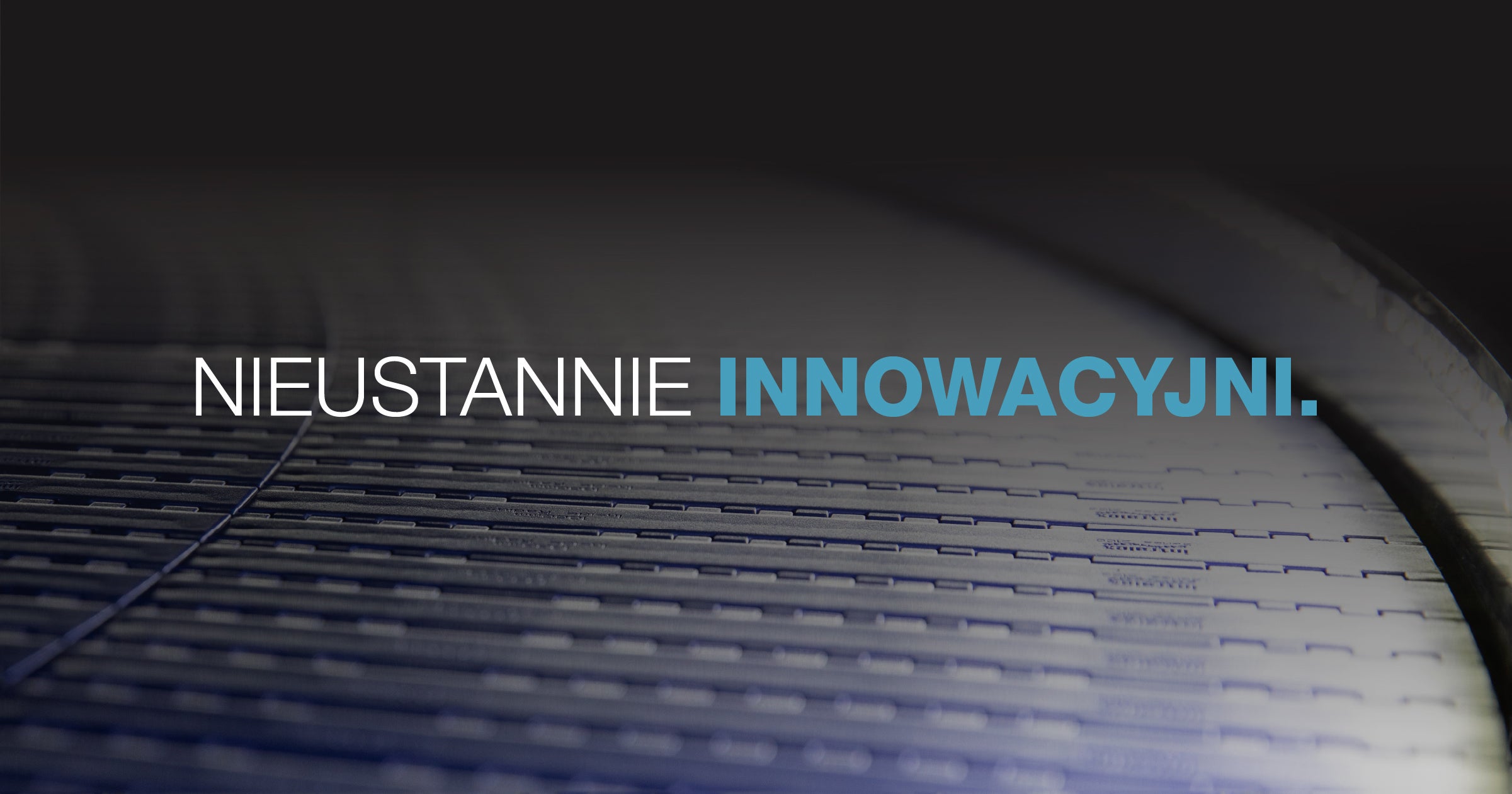 Niebieska taśma skrętna, napis: „Nieustanne innowacyjni”
