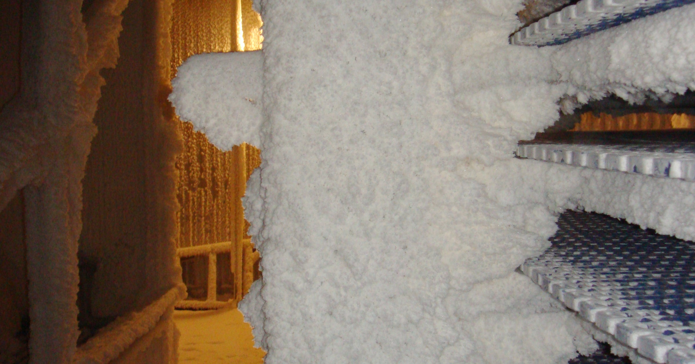 Frozen freezer coils with ice