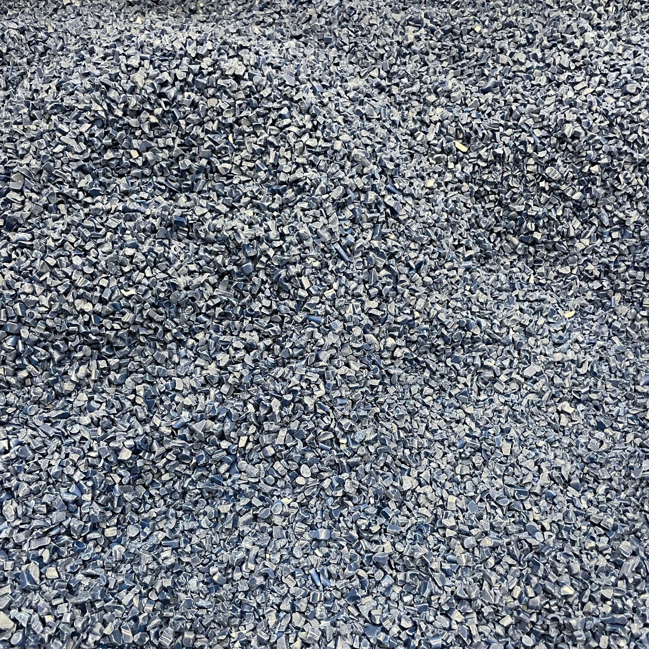 Small pieces of acetal belt regrind