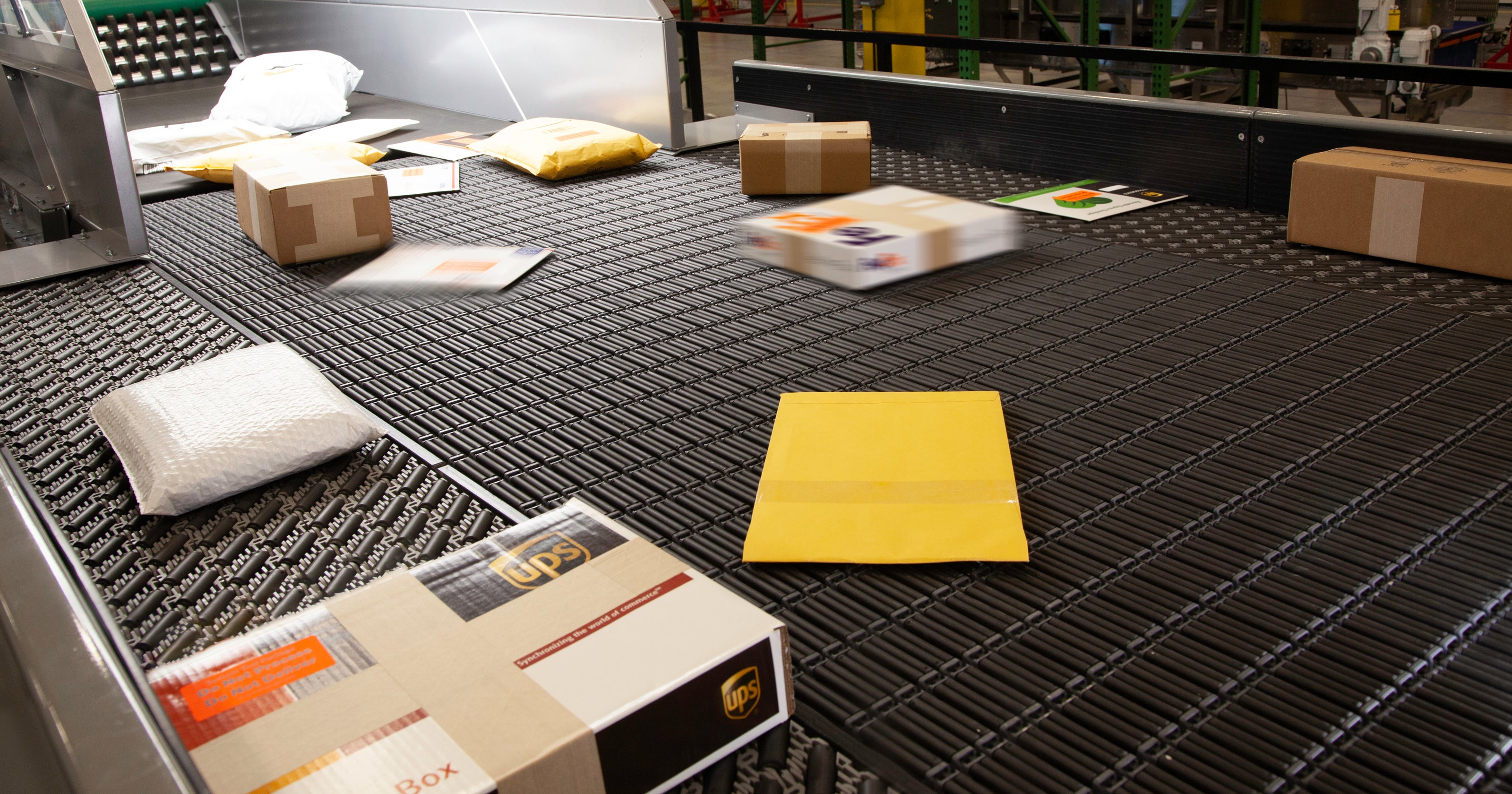 Envelopes and boxes on Intralox Smart Singulator