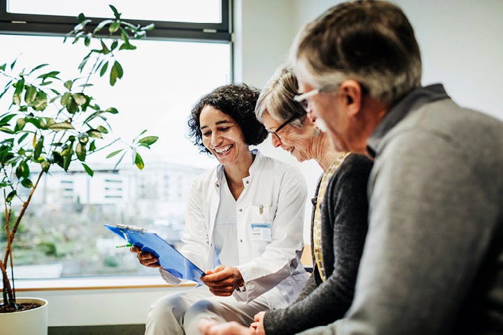 A couple discussing how they can lower their hospital costs using their private health insurance cover