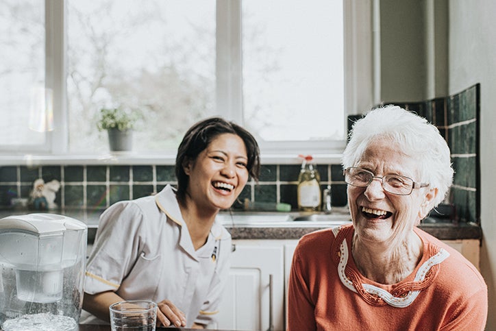 Two women sharing a laugh and a joke