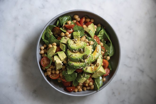 Love ya heart salad. A healthy salad, a great summer meal. Photo of a healthy green salad with avocado and beans.