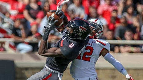 Texas Tech explodes past Houston in wild shootout, 63-49