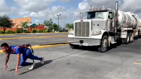 Watch: Texas high school football player pull 18-wheeler