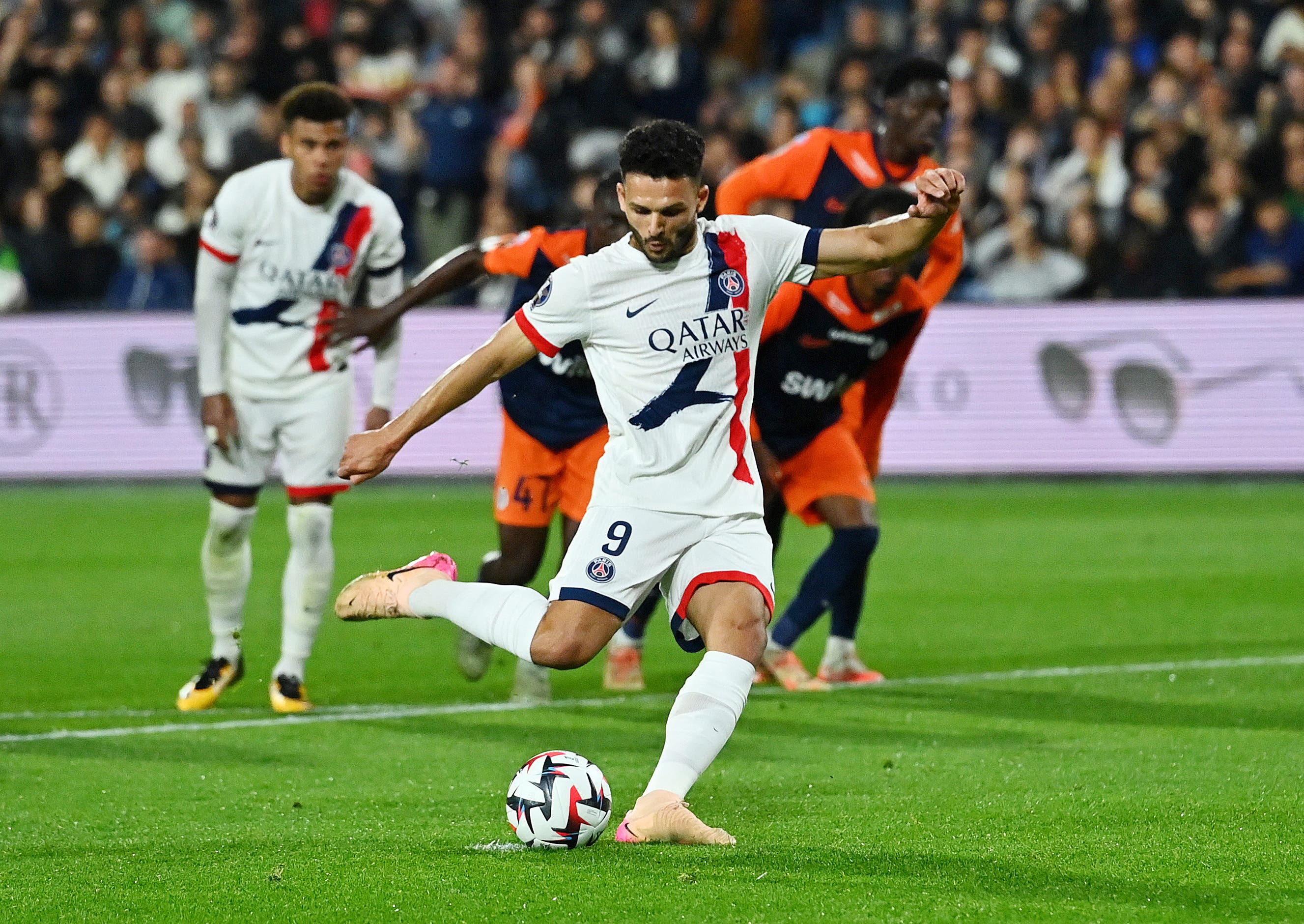 Soccer Football - Ligue 1 - Montpellier v Paris St Germain - Stade de la Mosson, Montpellier, France - May 10, 2025 Paris St Germain's Goncalo Ramos scores their third goal from the penalty spot REUTERS/Alexandre Dimou
