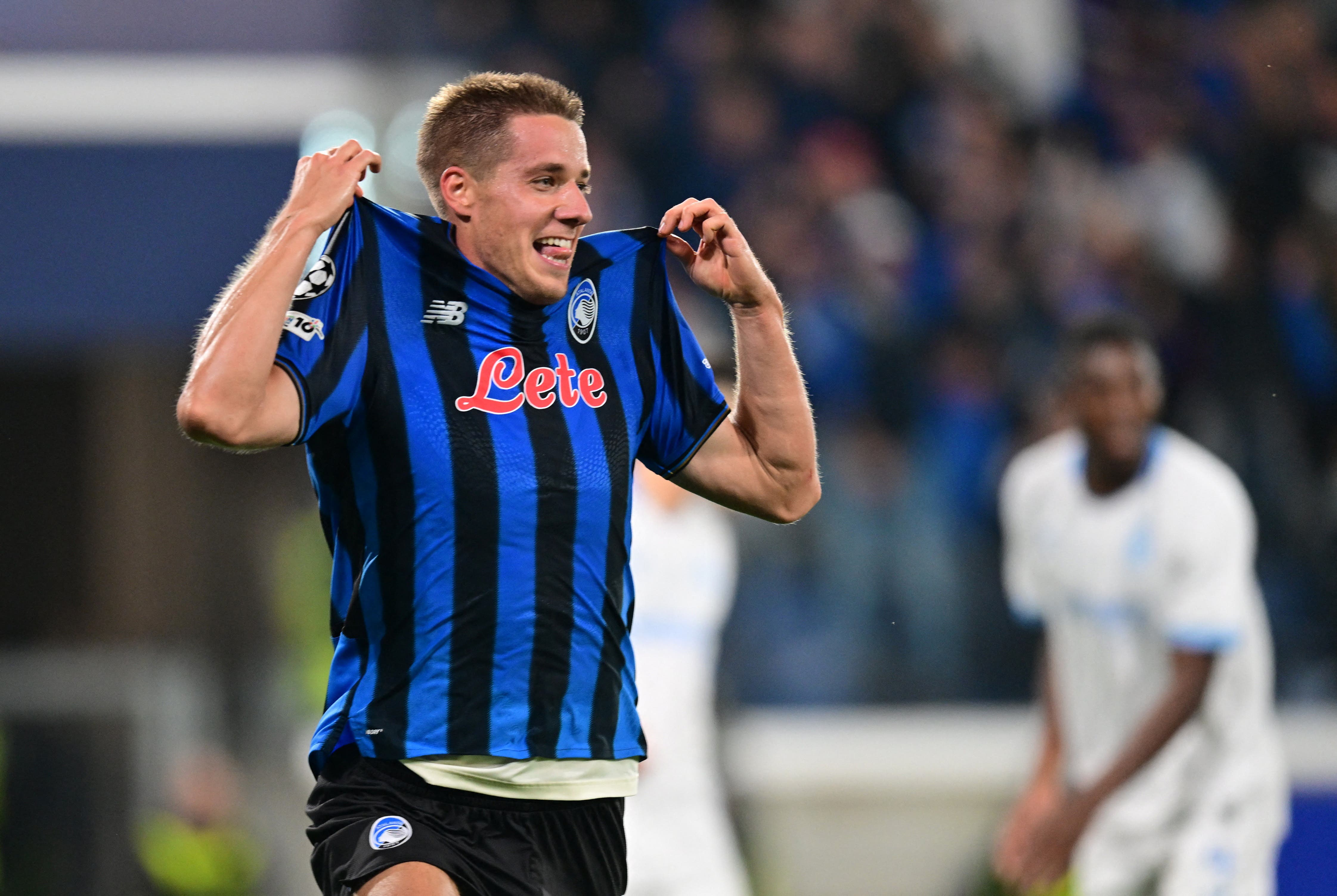 Soccer Football - UEFA Champions League - Atalanta v Club Brugge - Gewiss Stadium, Bergamo, Italy - September 30, 2025 Atalanta's Mario Pasalic celebrates scoring their second goal REUTERS/Daniele Mascolo