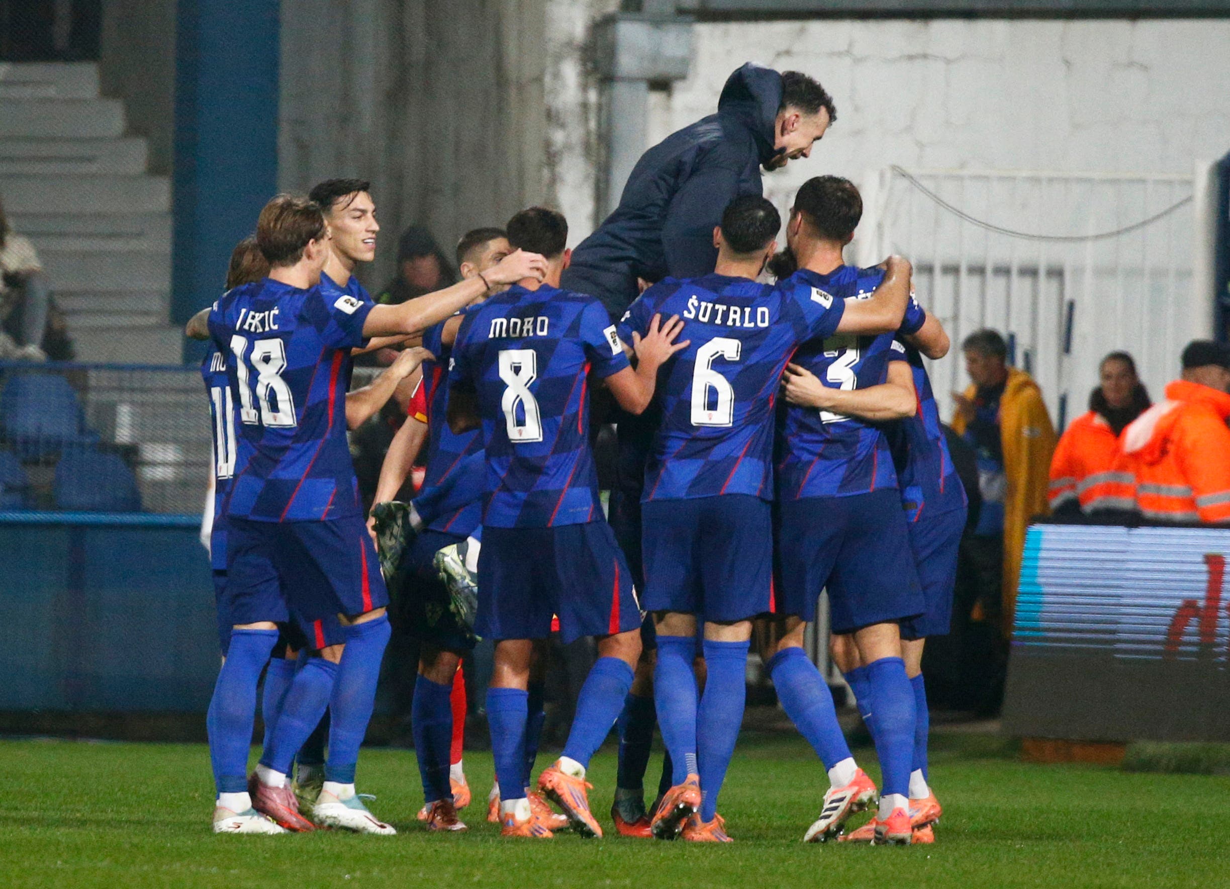 Soccer Football - World Cup - UEFA Qualifiers - Group L - Montenegro v Croatia - Podgorica City Stadium, Podgorica, Montenegro - November 17, 2025 Croatia's Nikola Vlasic celebrates scoring their third goal with teammates REUTERS/Stevo Vasiljevic