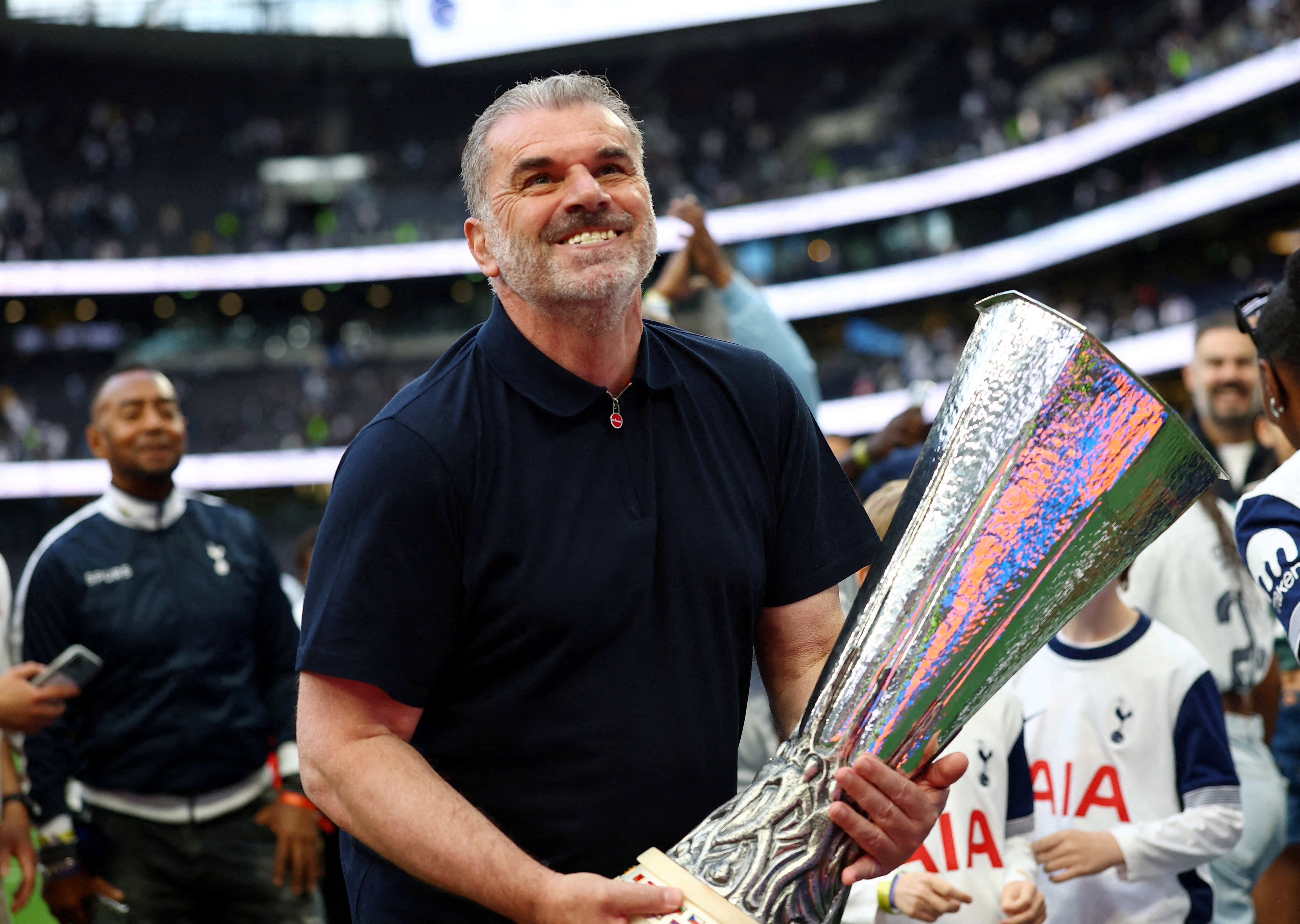 Tottenham Hotspur manager Ange Postecoglou with the Europa League trophy during a lap of appreciation after the match