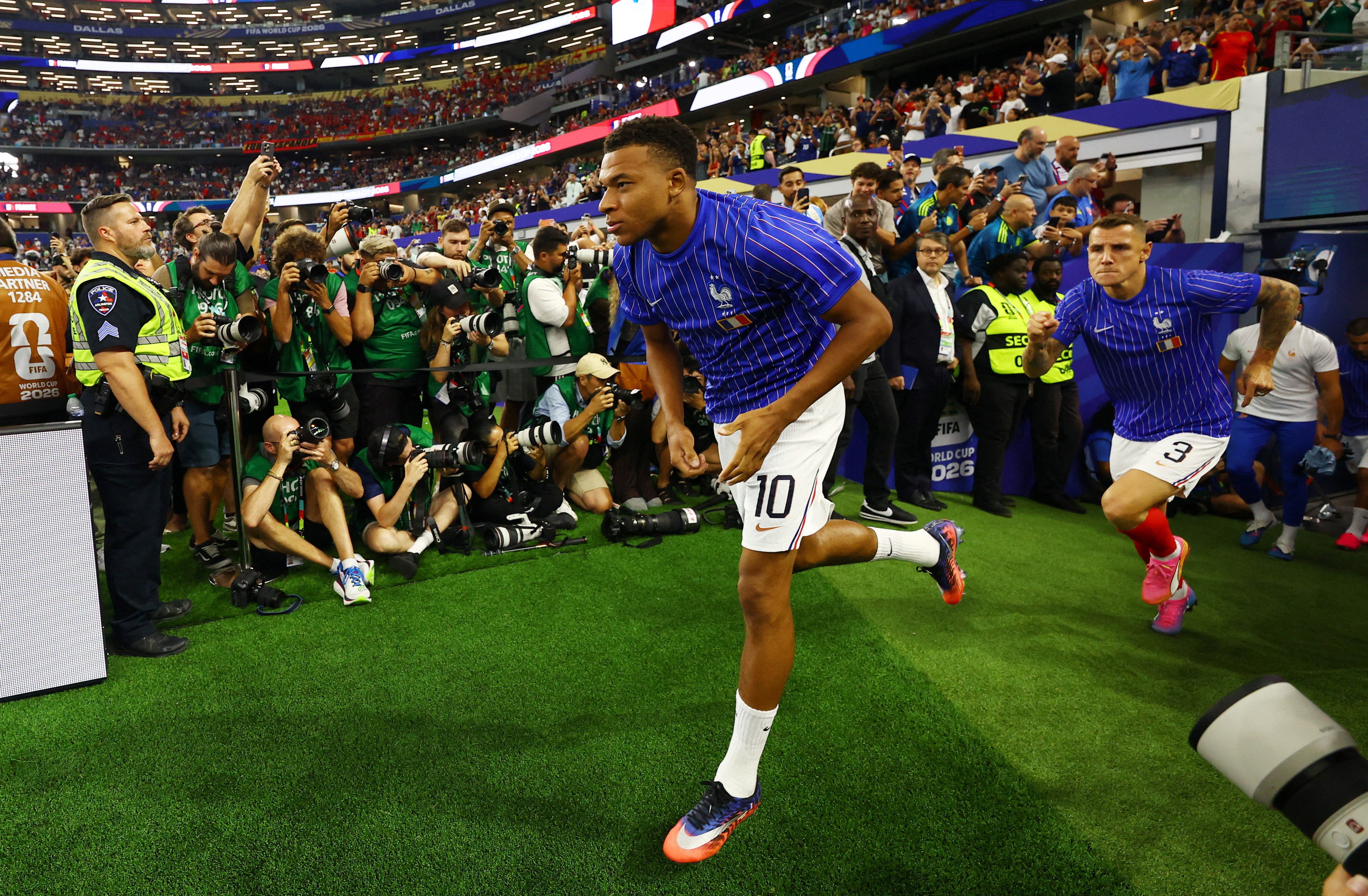 Soccer Football - FIFA World Cup 2026 - Semi Final - France v Spain - Dallas Stadium, Arlington, Texas, U.S. - July 14, 2026 France's Kylian Mbappe walks out for the warm up before the match REUTERS/Hannah Mckay TPX IMAGES OF THE DAY

