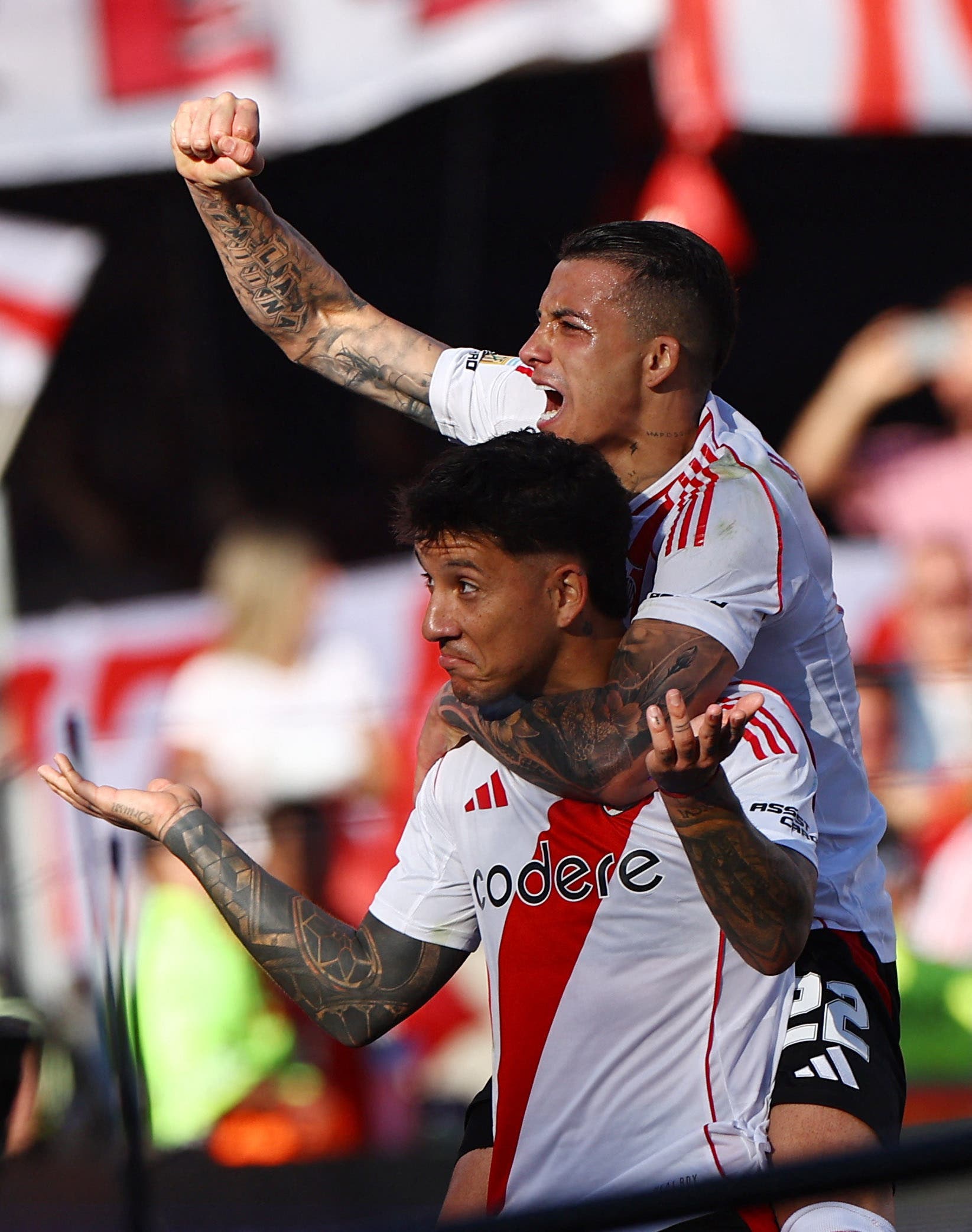 River Plate's Sebastian Driussi celebrates scoring their second goal with Kevin Castano