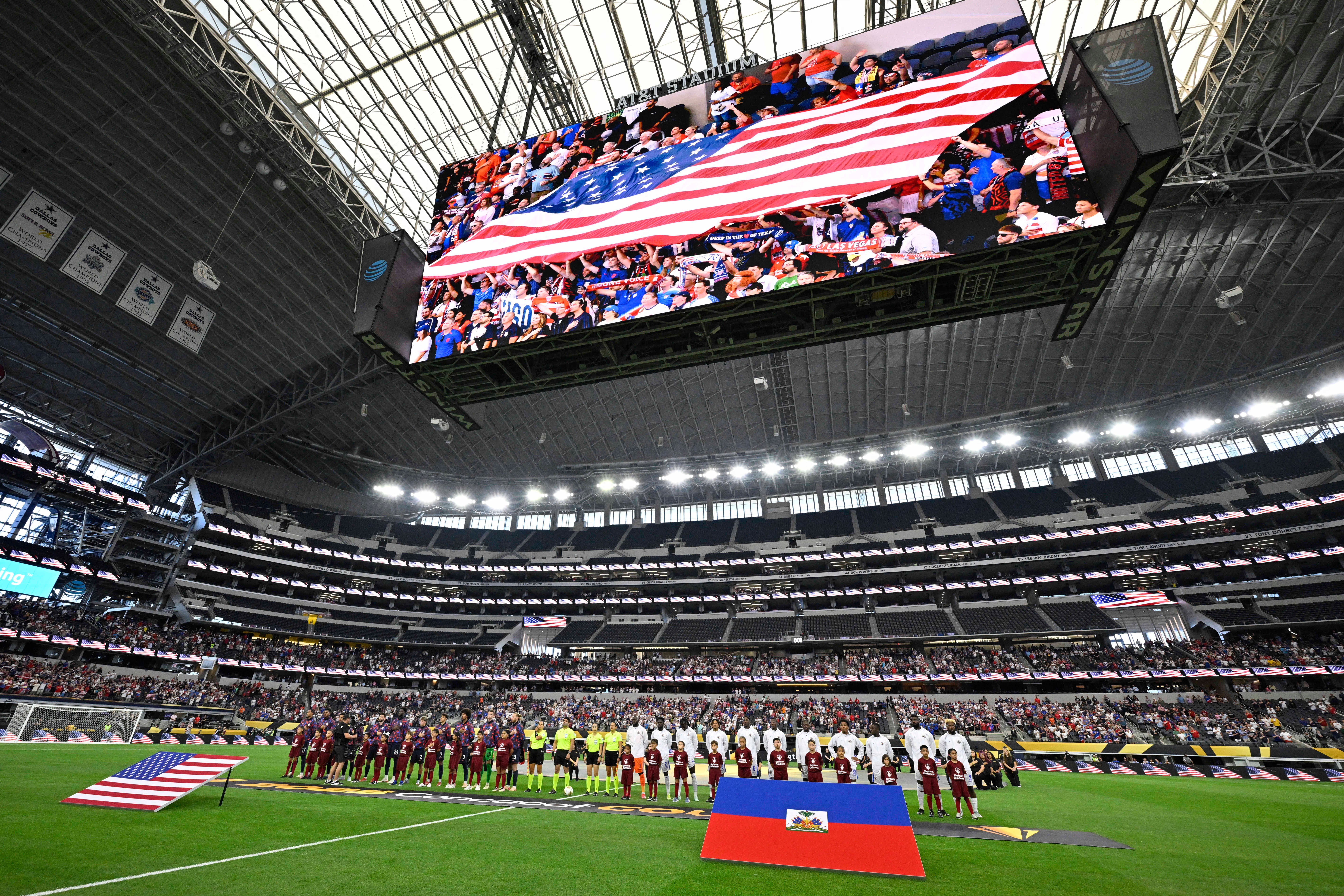 Jun 22, 2025; Arlington, Texas, USA; Haiti and United States of America line up for the National anthem prior to the first half during a group stage match of the 2025 Gold Cup at AT&T Stadium. Mandatory Credit: Jerome Miron-Imagn Images
