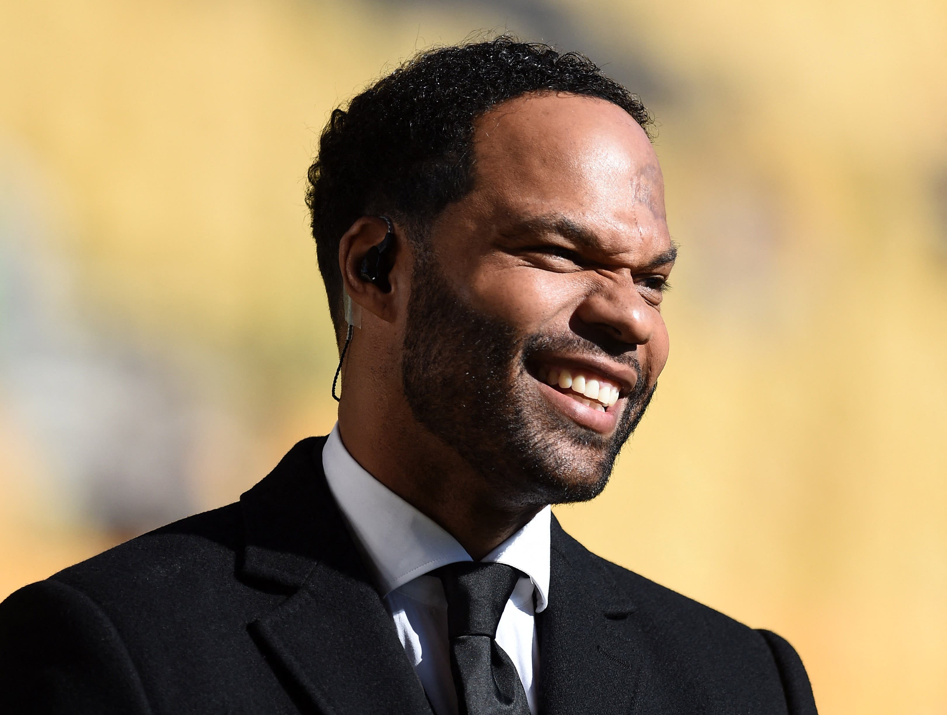 Soccer Football - Premier League - Wolverhampton Wanderers v Manchester City - Molineux Stadium, Wolverhampton, Britain - September 17, 2022 Former player and TV pundit Joleon Lescott is seen before the match REUTERS/Peter Powell EDITORIAL USE ONLY. No use with unauthorized audio, video, data, fixture lists, club/league logos or 'live' services. Online in-match use limited to 75 images, no video emulation. No use in betting, games or single club /league/player publications. Please contact your account representative for further details.

