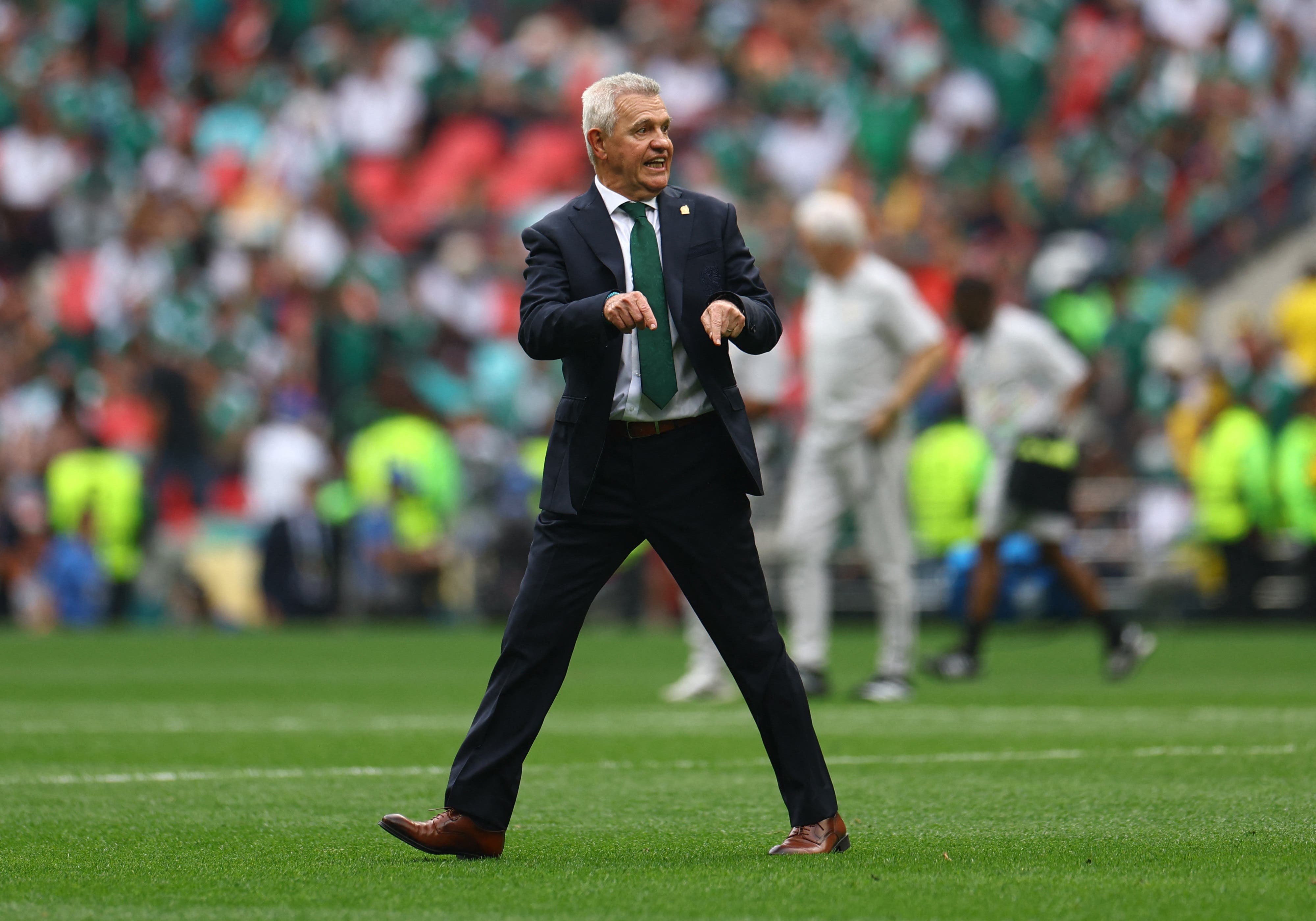 Soccer Football - FIFA World Cup 2026 - Group A - Mexico v South Africa - Estadio Azteca, Mexico City, Mexico - June 11, 2026 Mexico coach Javier Aguirre reacts as he walks off for half time REUTERS/Hannah Mckay


